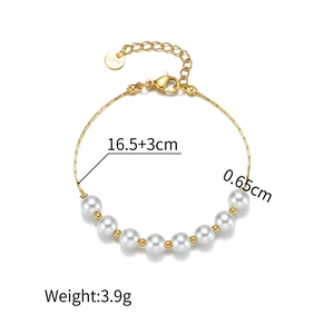 Minimalist gold stainless steel bracelet with white pearls and adjustable lobster clasp