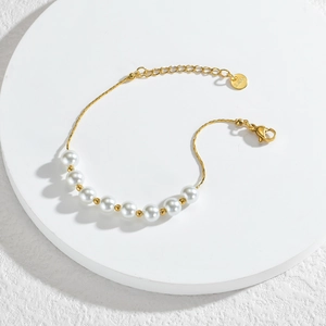 Minimalist stainless steel gold pearl bracelet with adjustable chain for women