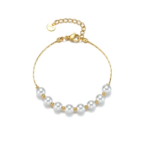 Golden stainless steel pearl bracelet featuring eight round white pearls and adjustable chain