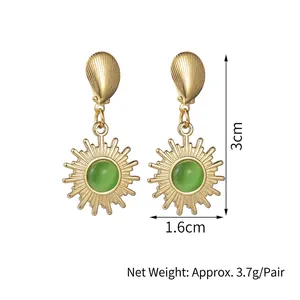 Vintage gold sunburst earrings with conch stud and green gemstone, 3cm drop length