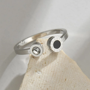 Minimalist geometric open ring with Roman numerals and sparkling cubic zirconia accent