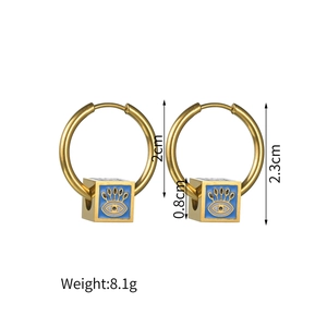Gold hoop earrings with blue enamel evil eye cube pendants for a vintage French aesthetic