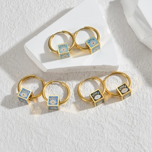 Vintage French gold cube earrings with enamel evil eye charms on geometric stands