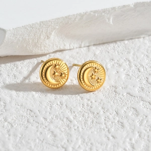 Golden stainless steel stud earrings with embossed celestial moon and star pattern