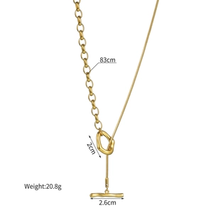 Detailed view of asymmetric gold necklace with O-ring, T-bar toggle, and 83cm chain length
