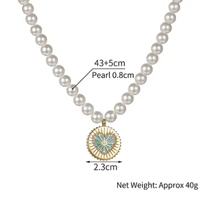 Collana di perle vintage francese con ciondolo a cuore blu da 2,3cm e catena 43+5cm