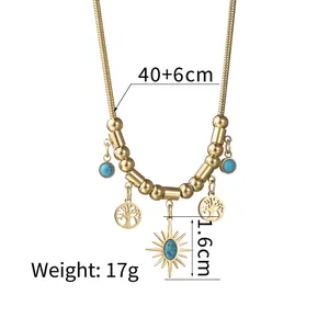 Collier arbre de vie en acier doré avec pendentif soleil turquoise et chaîne serpent