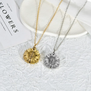 Minimalist sunflower locket necklace set in gold and silver finish with fine petal texture