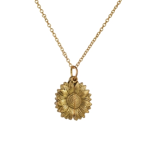 Minimalist gold sunflower pendant necklace in vintage style on white background
