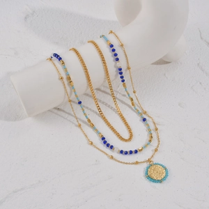 Collar multicapa de acero inoxidable de 14K con cuentas azules y colgante redondo