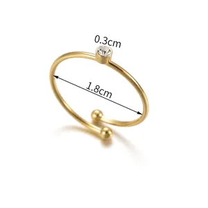 Bague en acier inoxydable doré 14K avec pierre de 0.3cm et diamètre de 1.8cm