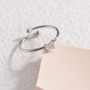 Adjustable silver butterfly open ring with sandblasted matte finish and beaded detail