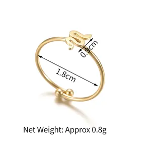Anello aperto a serpente dorato minimalista con diametro 1,8 cm e dettaglio a due sfere