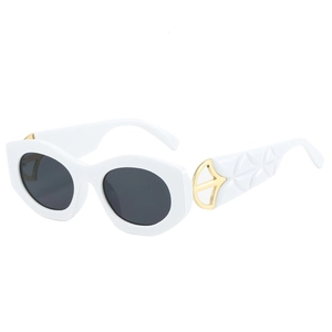 Cat eye oversized sunglasses in white with golden arrow metallic hinges and black lenses