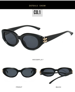 Detailed views of black oval cat-eye sunglasses with gold metal ring accents on frames