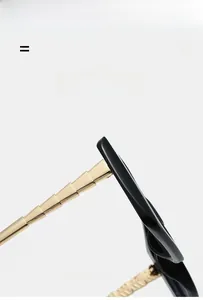 Detail of stylish square sunglasses featuring lightweight and super elastic metal temples
