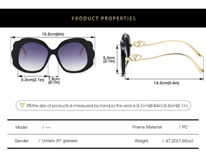 Detailed size specifications for oval sunglasses with scalloped edges and heart accents