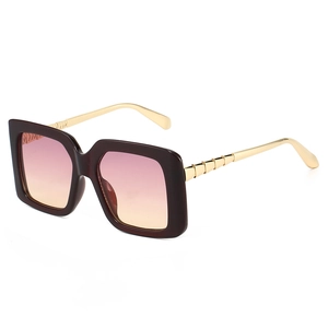 Fashionable oversized square sunglasses with gradient lenses and bamboo-style gold temples