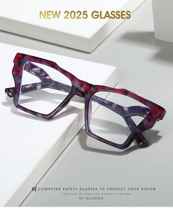 Macro shot of stylish tortoiseshell cat-eye glasses with unique purple and blue patterns