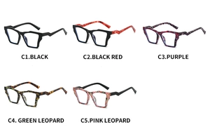Flat lay of cat eye glasses frames in assorted colors including marble and leopard patterns