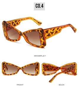 Front and back views of tortoiseshell butterfly sunglasses with gradient brown lenses
