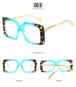 Vue détaillée de lunettes carrées bleu et écaille avec des branches en métal doré gaufré