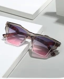 Macro shot of M6244 sunglasses showing gradient purple lenses and square frame details