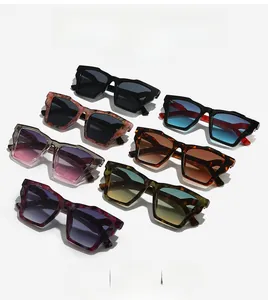 Detailed grid of oversized rectangular sunglasses in various colors and marble textures