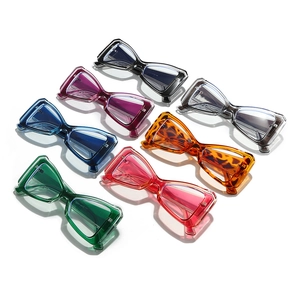 Set of colorful geometric cat eye sunglasses in seven transparent fashion colors