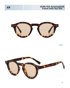 Detailed views of tortoiseshell round sunglasses with tea lenses and metal rivet accents