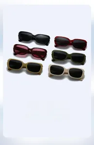 Multiple color options for rectangular sunglasses in black, red, green, and beige