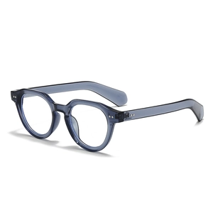Retro round frame sunglasses in dark blue transparent resin with silver rivet accents
