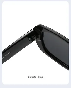 Macro shot of durable hinge mechanism and size specifications on black sunglasses frame