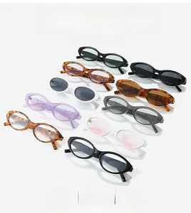 Macro display of oval retro sunglasses in multiple vibrant colors and sleek frames