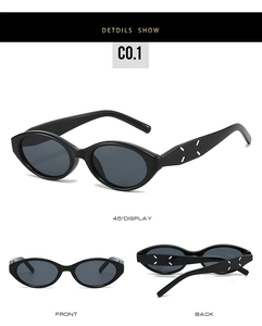 Detail view of black cat eye sunglasses featuring iconic four-stitch white temple design