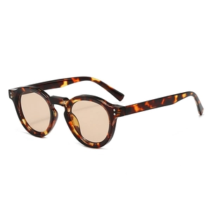 Classic retro round tortoiseshell sunglasses with amber lenses and vintage metal studs