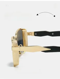 Detailed macro shot of durable textured gold metal hinges on stylish square sunglasses