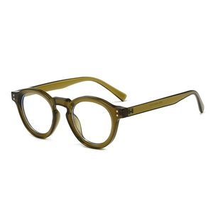 Retro round olive green translucent sunglasses with classic silver rivet details