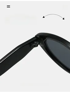 Detail view of durable metal hinge on black cat-eye sunglasses with high gloss finish
