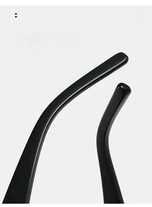 Detail of curved ergonomic temple tips on black sunglasses for comfortable daily wear