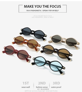 Détail de lunettes de soleil ovales vintage avec coins métalliques en six coloris différents
