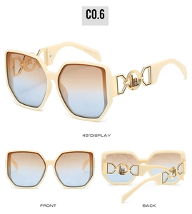 Three views of cream oversized sunglasses with gradient lenses and gold metal hinge details