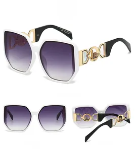 Detailed views of oversized sunglasses with white frames and gold镂空 temple accents
