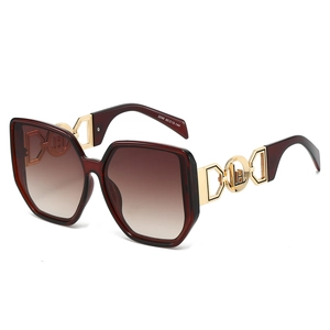 Oversized burgundy gradient sunglasses with luxury gold hollow metal temple accents