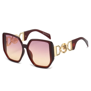 Stylish oversized burgundy sunglasses with gradient lenses and gold metal temples