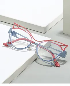 Detail of stylish cat-ear frames with red and gray hollow design for anti-blue light glasses