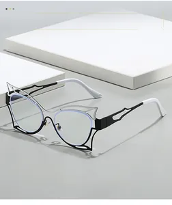 Detailed shot of hollowed-out cat-eye metal frame with anti-blue light lenses and textures