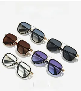 Five styles of classic aviator sunglasses with metal frames in various lens colors