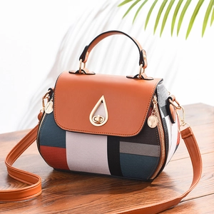 Fashionable patchwork print shell bag with gold water-drop lock and crossbody strap