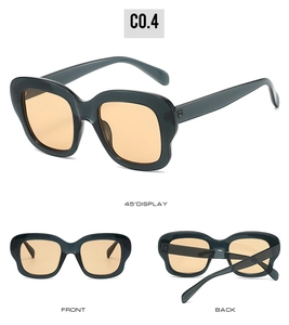 Vues détaillées de lunettes de soleil vintage avec monture grise et verres orange